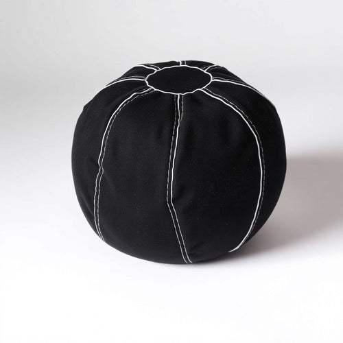 8-panel black suede footbag with white stitching